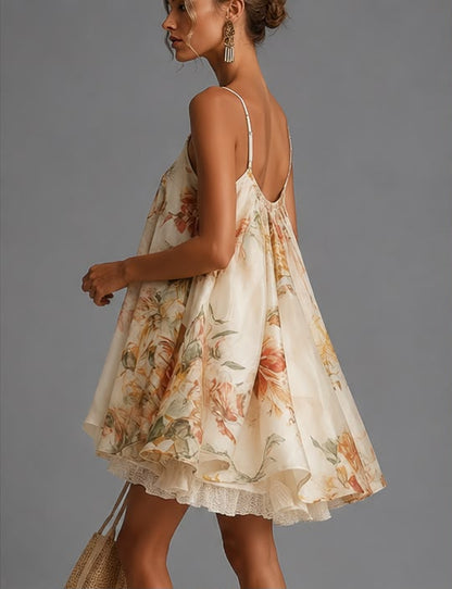 Minivestido Flora | De corte en A de organza beige con estampado floral y ribete de encaje